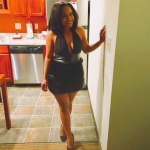 Black Halter Top Dress with feather bottom.